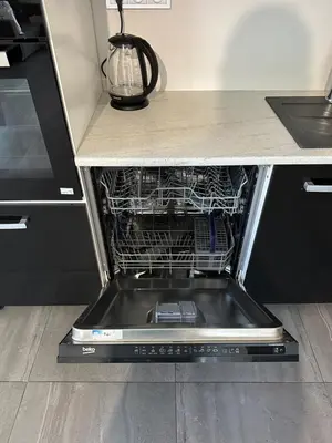a dishwasher with its door open in a kitchen at Apartmán byt 75m2 klid příroda pro rodinu in Prague