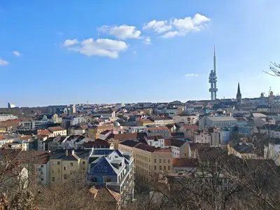 a view of a city with a tower in the background at Flat in Zizkov -303- in Prague