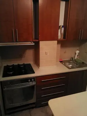 a kitchen with a stove and a sink at Vila Barrandov in Prague