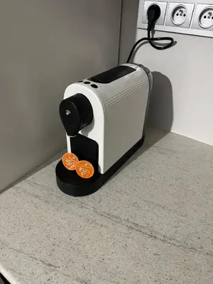 a toaster sitting on a counter with two oranges at Byt apartman 73m2 Klid příroda Parking FREE in Prague