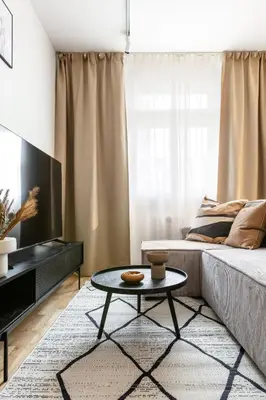 a white table with a plate of fruit on it at TurnKey I Republic Square Apartments in Prague