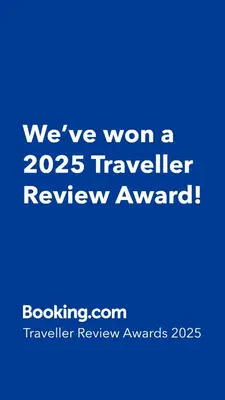 a blue sign that says weve won a traveler review award at Cozy Design Homestay with terrace in Prague