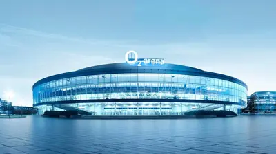 a large glass building with a sign on it at Apartment - O2 Arena Prague with parking in Prague