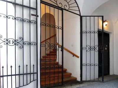 an open gate with a staircase in a building at Apartment Old Town home-5 by Interhome in Prague