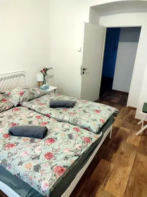 a bedroom with two beds with pillows on it at Nice one bedroom apartment in zizkov in Prague