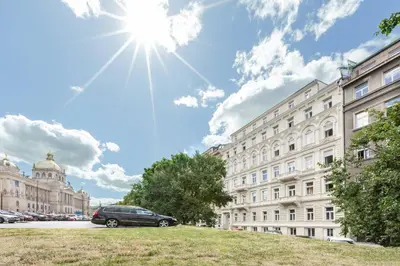 a car parked in front of a building at Cozy Apartment by Wenceslas square in Prague