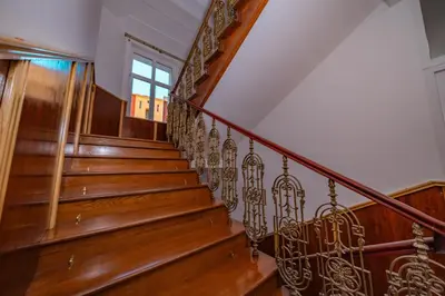 a kitchen with white cabinets and a sink at 4 Bob's Apartments - 3 bedrooms, King size beds in Prague