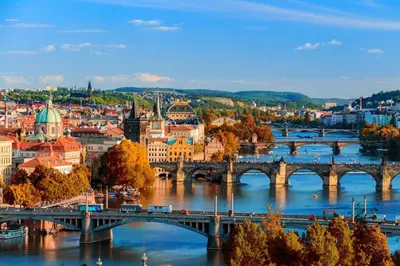 a view of a city with a bridge over the river at Classic room E5 Prague centre in Prague