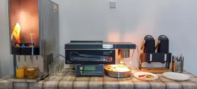 a kitchen counter with a coffee maker and a toaster at Traveller's room F1 u výstaviště in Prague