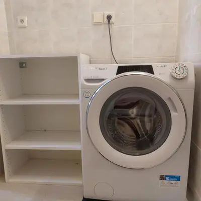 a washing machine sitting in a room with at Just 3 min Walk Old Town Center private room B in Prague