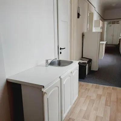 a white kitchen with a sink and a refrigerator at Just 3 min Walk Old Town Center private room B in Prague