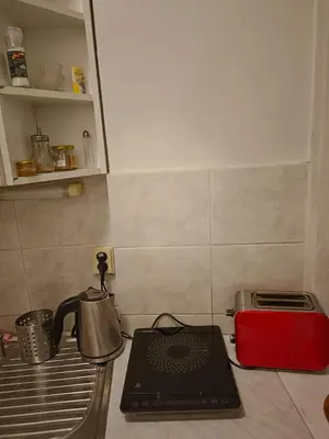 a kitchen counter with a tea kettle and a toaster at 3 min Walk Old Town Center private room B in Prague