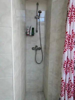 a bathroom with a shower with a shower curtain at 3 min Walk Old Town Center private room B in Prague