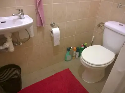 a bathroom with a white toilet and a sink at Charles bridge, Old town3 Min walk Private Room A in Prague