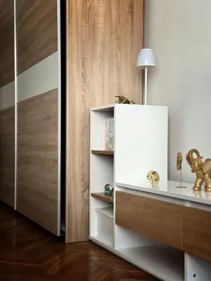 a room with a white cabinet with a lamp on it at Apartment 23 in Prague
