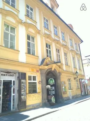a large building on a city street with a store at Old Town Center Just in 3 min Walk private room B in Prague