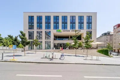 a building with a bike parked in front of it at Blueground Letná museums foodie area PRG-56 in Prague