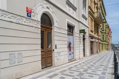 an empty street in a city with buildings at Blueground Prague 7 renovated student housing PRG-59 in Prague