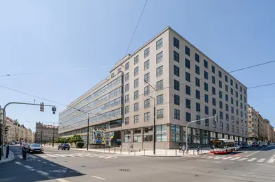 a large building on the corner of a street at Blueground Prague 7 renovated student housing PRG-59 in Prague