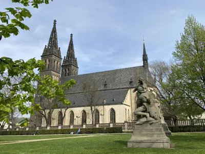 a statue in front of a building with a church at Apartment Washington-2 by Interhome in Prague