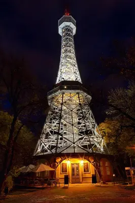a lit up eiffel tower at night at Soukromé křídlo pro 7 osob v Praze in Prague