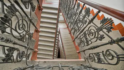 a set of stairs leading up to a building at Stylish Apartment near Wenceslas Square in Prague