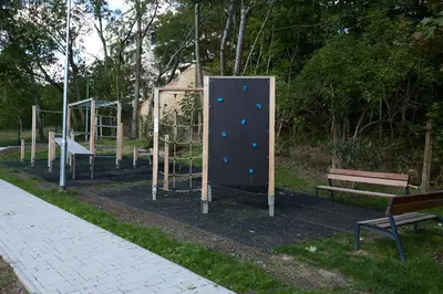 a playground with a climbing equipment in a park at Mucha Residence - with free weekend parking in Prague