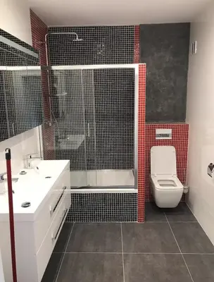 a bathroom with a shower and a toilet and a sink at Big apartment in quiet location close to the center -ideal for families with kids in Prague