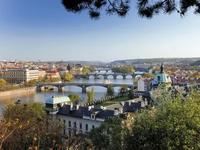 a view of a city with a river and bridges at Apartment Washington-4 by Interhome in Prague