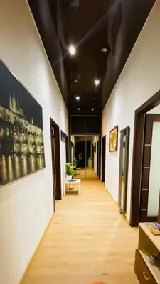 a hallway of an office building with a long corridor at LOvely room in the Centre in Prague
