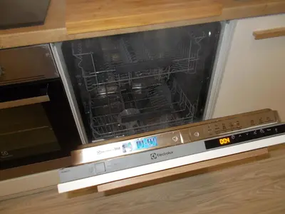 an oven with its door open in a kitchen at Andel Centre SPIRIT in Prague