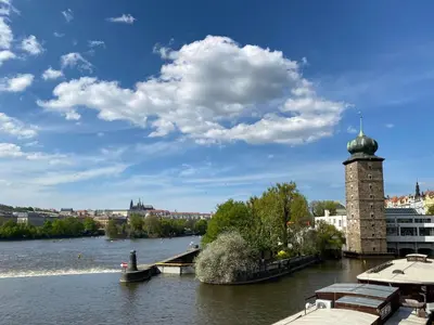 a view of a river with a clock tower at Holiday Home Prima by Interhome in Prague