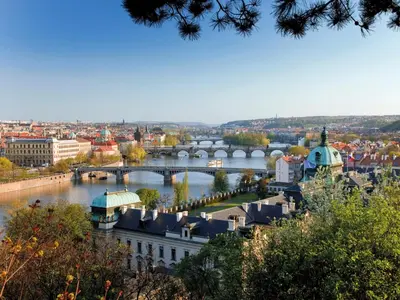 a view of a city with a river and bridges at Holiday Home Prima by Interhome in Prague