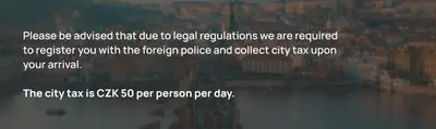 a screenshot of a webpage with a city in the background at Stylish penthouses featuring a terrace in Prague in Prague